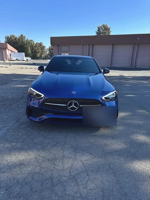 A finished Mercedes-Benz C-Class outside the Brands Auto Body shop