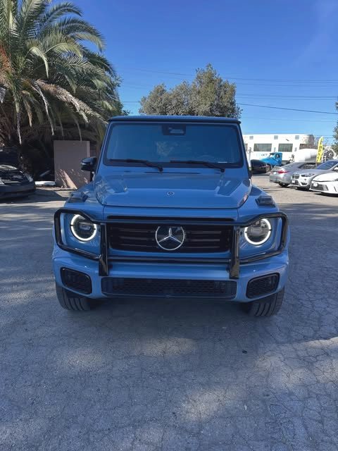 Blue Mercedes-Benz G-Class completed and parked at the shop
