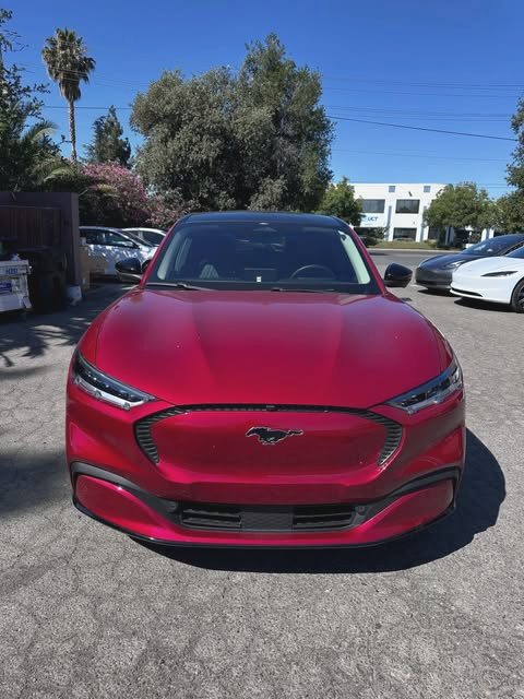 Red Ford Mustang Mach-E after paint and refinishing work